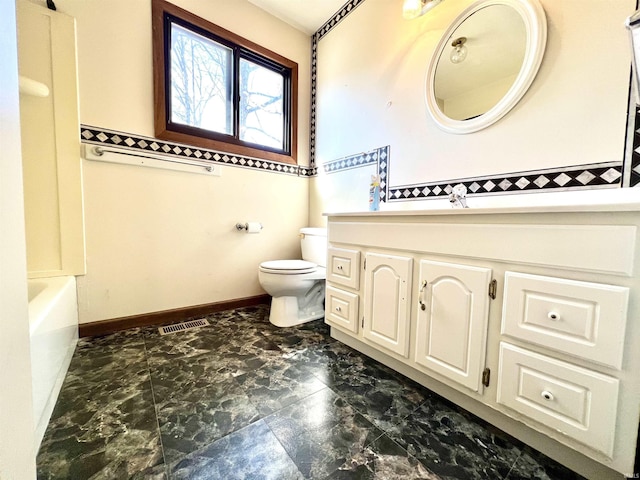 bathroom with visible vents, toilet, vanity, and baseboards