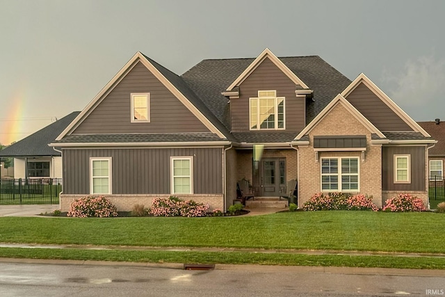 18525 Whitfield Ct, Evansville, IN 47725 - craftsman inspired home with brick siding, a shingled roof, and board and batten siding