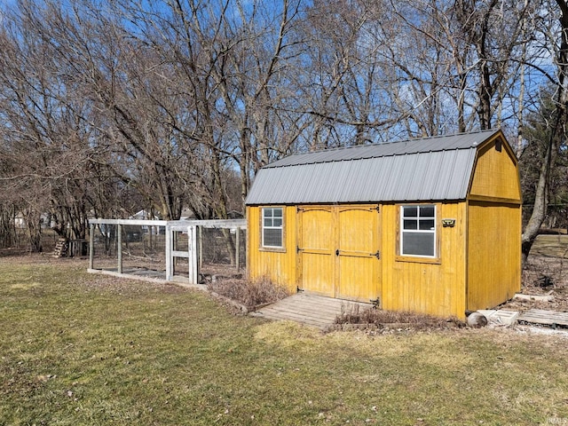 view of poultry coop with a yard