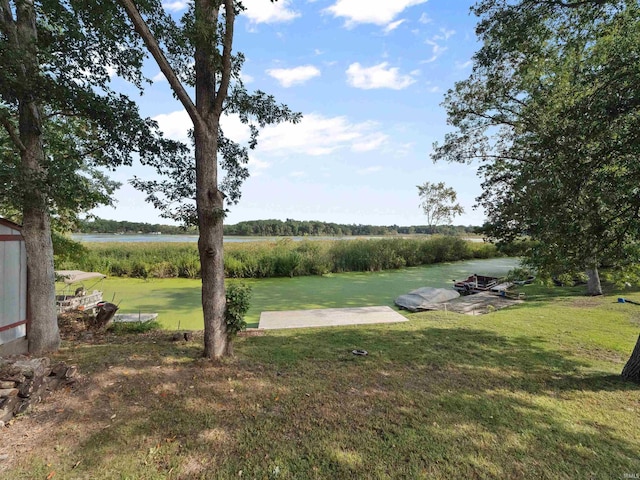 view of yard with a water view