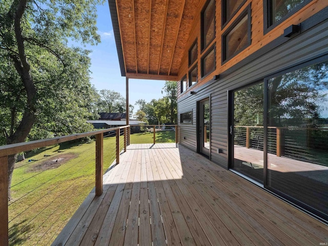 deck featuring a lawn