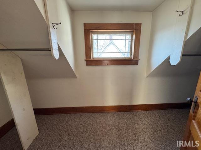 interior details with carpet flooring and baseboards