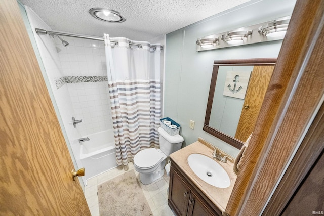 full bath featuring toilet, vanity, shower / bath combo, tile patterned floors, and a textured ceiling