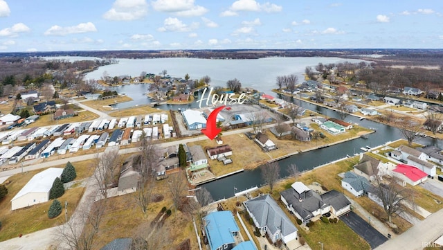 aerial view with a residential view and a water view