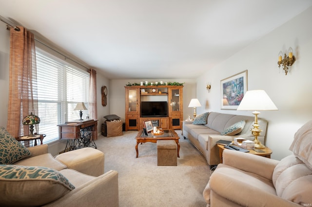 living area with light colored carpet