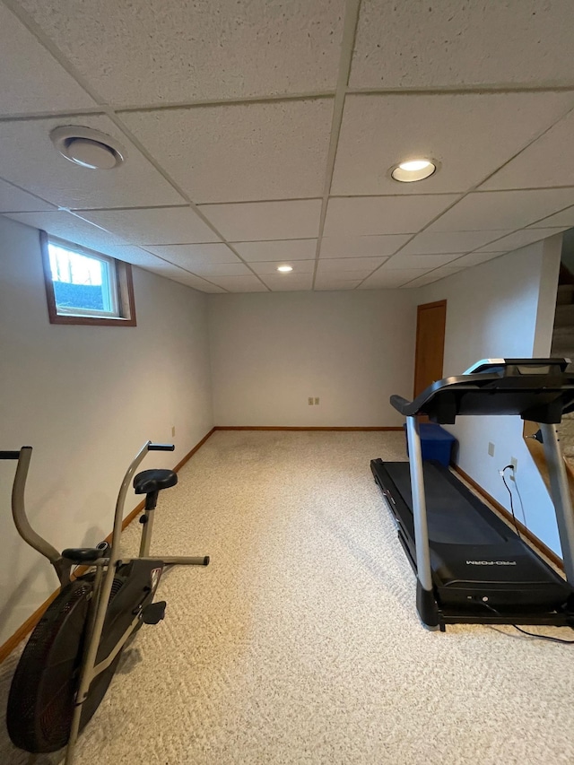 workout area with recessed lighting, carpet flooring, a paneled ceiling, and baseboards