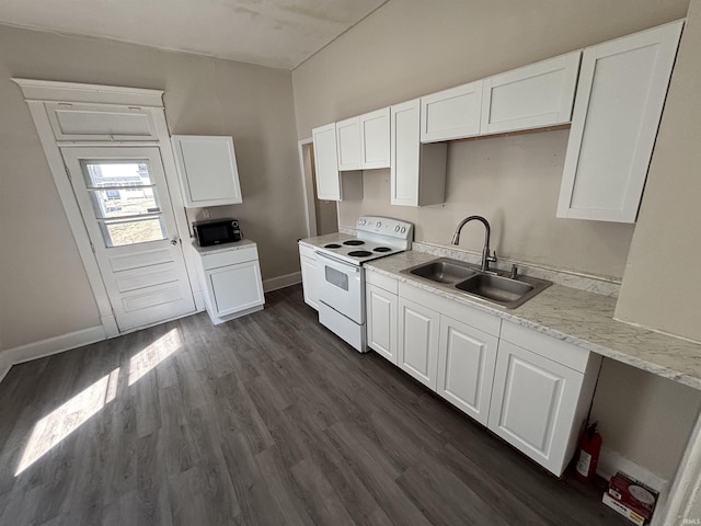 kitchen featuring a sink, white cabinets, black microwave, and white range with electric stovetop