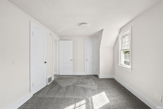 interior space with baseboards and visible vents