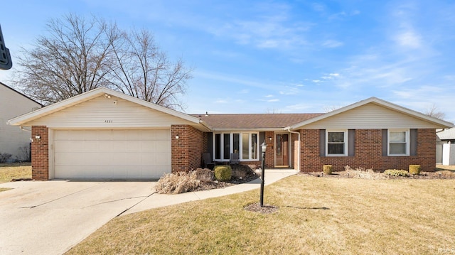 ranch-style home featuring concrete driveway, an attached garage, brick siding, and a front lawn