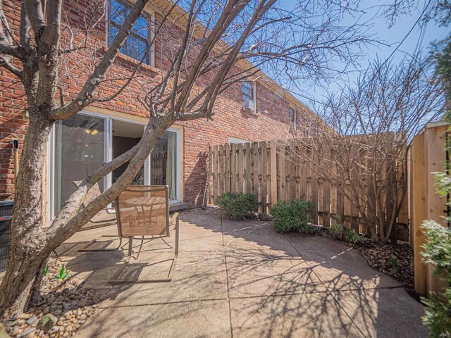 view of patio / terrace with fence