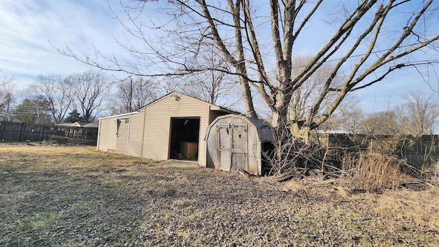 view of shed featuring a fenced backyard