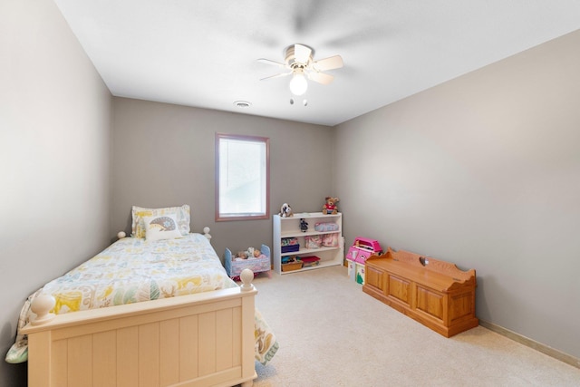 bedroom with visible vents, a ceiling fan, baseboards, and carpet floors