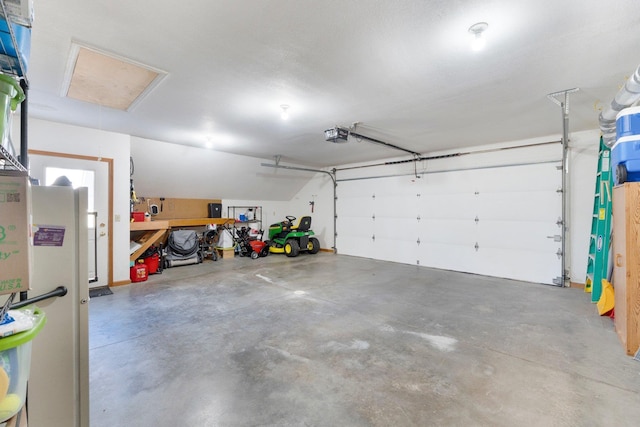 garage featuring a garage door opener