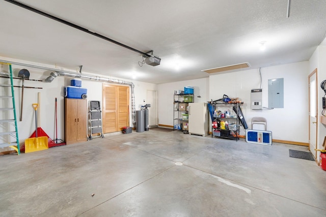 garage featuring electric panel, freestanding refrigerator, a garage door opener, and baseboards