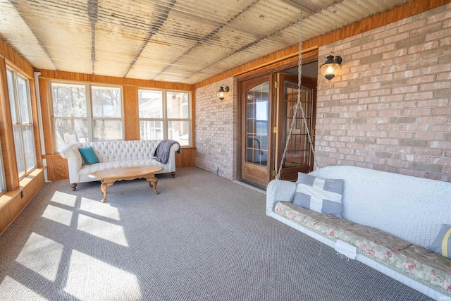 sunroom / solarium featuring wooden ceiling