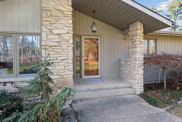 view of exterior entry with stone siding