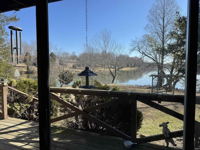 wooden terrace with a water view