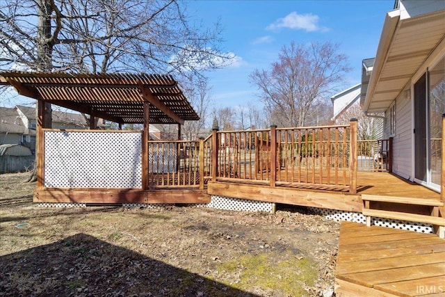 wooden deck with a pergola