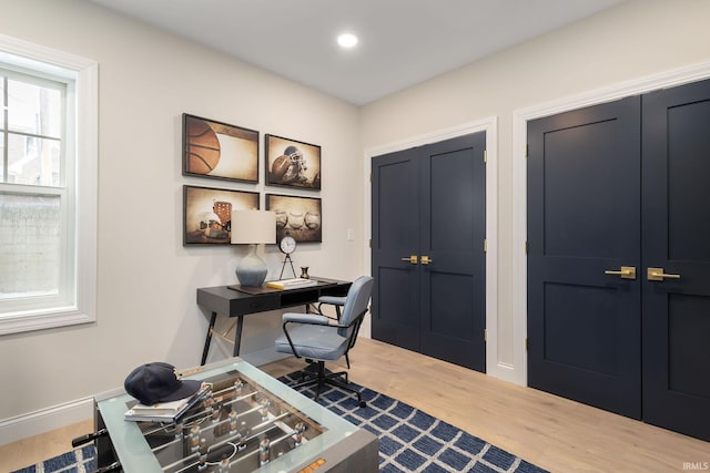 office space with recessed lighting, baseboards, and wood finished floors