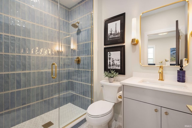 full bathroom featuring vanity, toilet, and a stall shower