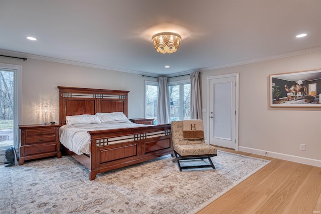 bedroom featuring crown molding, recessed lighting, light wood-style floors, and baseboards