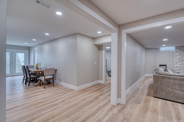 dining room with recessed lighting, visible vents, light wood-style flooring, and baseboards