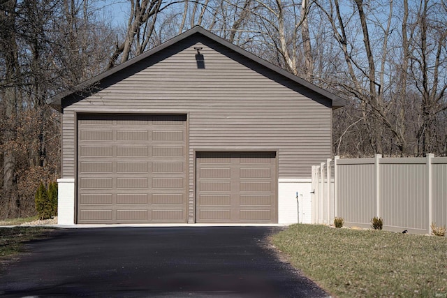 detached garage with fence