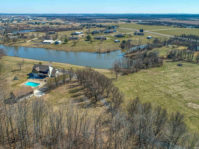 bird's eye view with a water view and a rural view