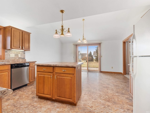 kitchen with decorative light fixtures, dishwasher, light countertops, vaulted ceiling, and freestanding refrigerator