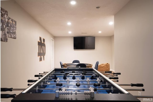 recreation room with recessed lighting