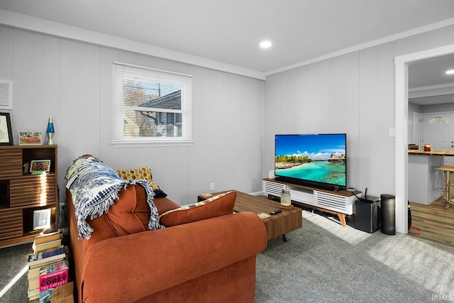 living room featuring recessed lighting and carpet