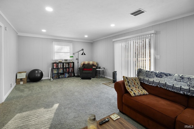 living room with recessed lighting, visible vents, carpet, and ornamental molding