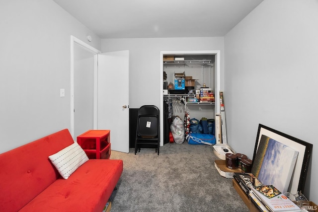 sitting room with carpet floors