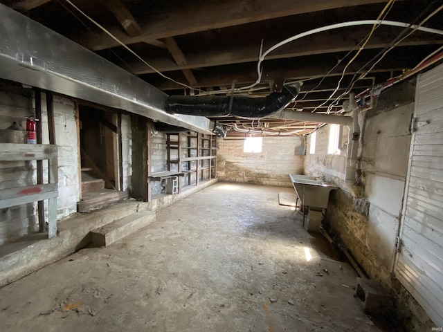 basement featuring stairway