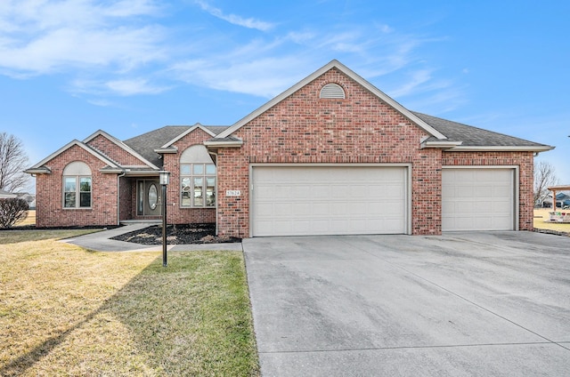 single story home with brick siding, a front lawn, roof with shingles, a garage, and driveway