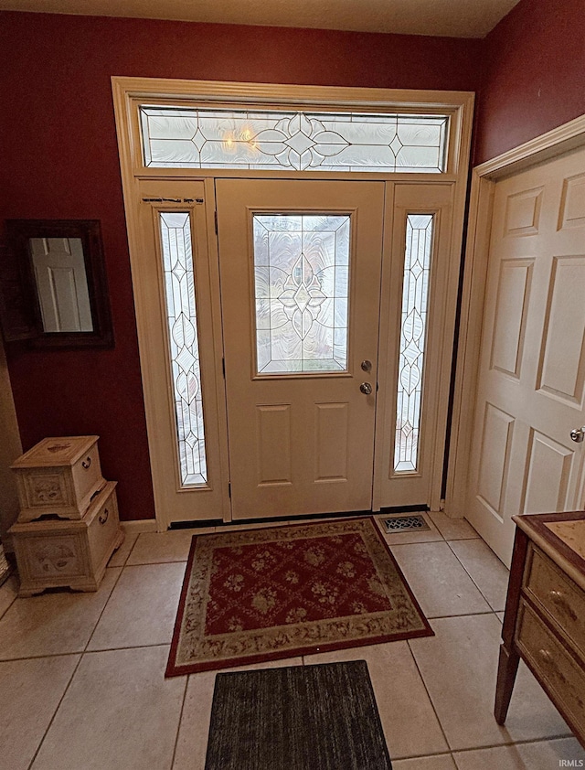 entrance foyer with light tile patterned flooring