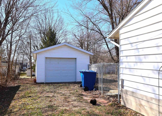 detached garage with fence