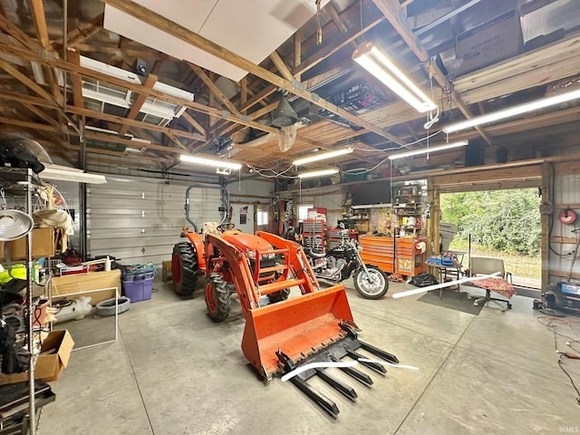 garage with a workshop area