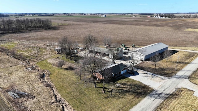 birds eye view of property featuring a rural view