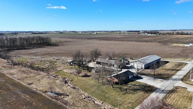 birds eye view of property featuring a rural view