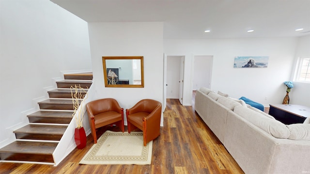 living area featuring stairway, recessed lighting, and wood finished floors