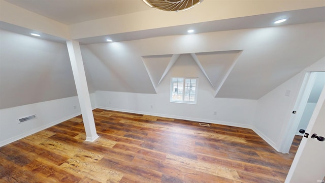 bonus room with visible vents, wood finished floors, recessed lighting, baseboards, and lofted ceiling