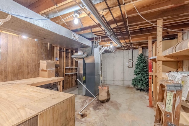 unfinished basement with heating unit