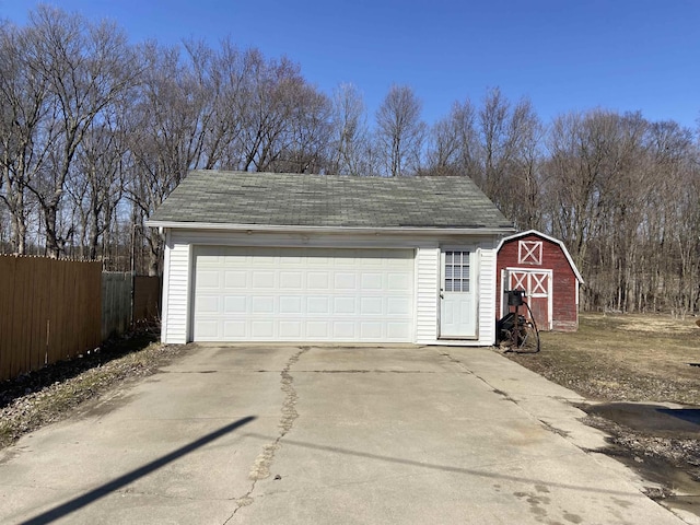 detached garage with fence