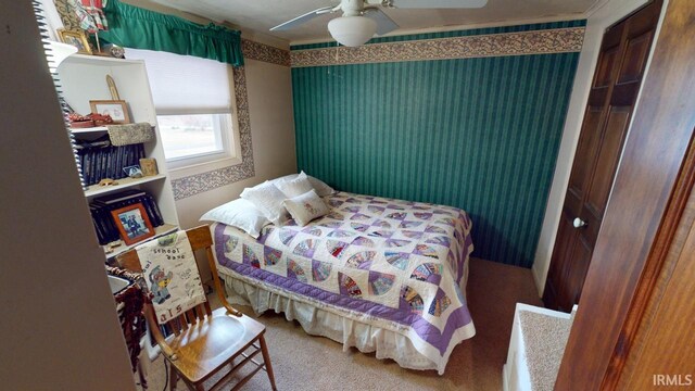 bedroom featuring carpet and ceiling fan