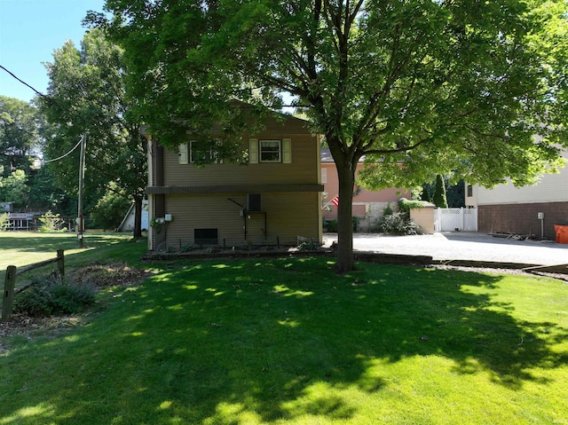 view of yard featuring a patio and fence