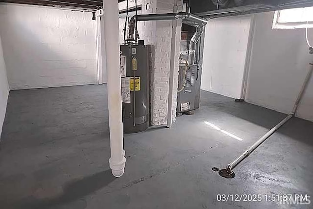 basement with heating unit and water heater