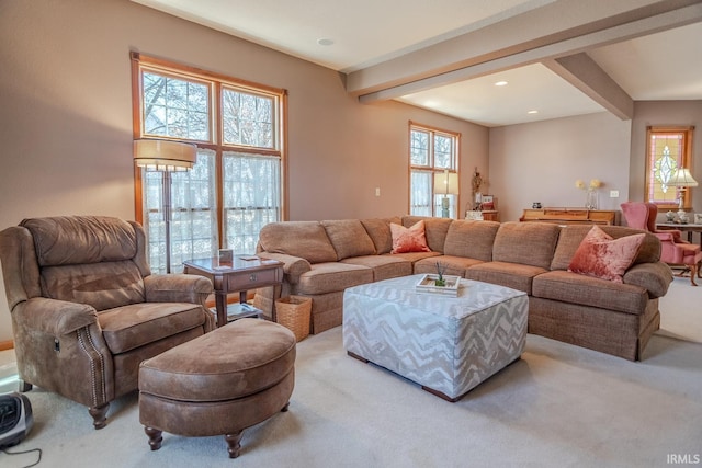 living room featuring recessed lighting, beam ceiling, and light carpet