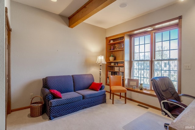 home office featuring beam ceiling, carpet flooring, visible vents, and baseboards