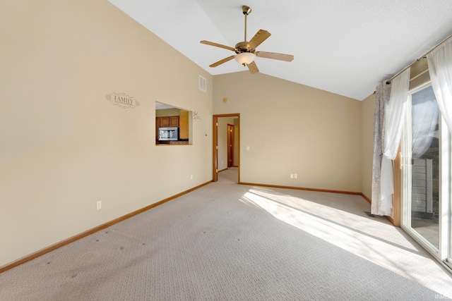 unfurnished room featuring visible vents, high vaulted ceiling, a ceiling fan, baseboards, and light colored carpet